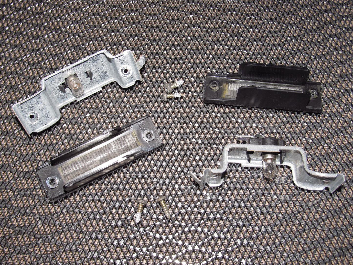 83-85 Porsche 944 OEM Rear License Plate Light - Set