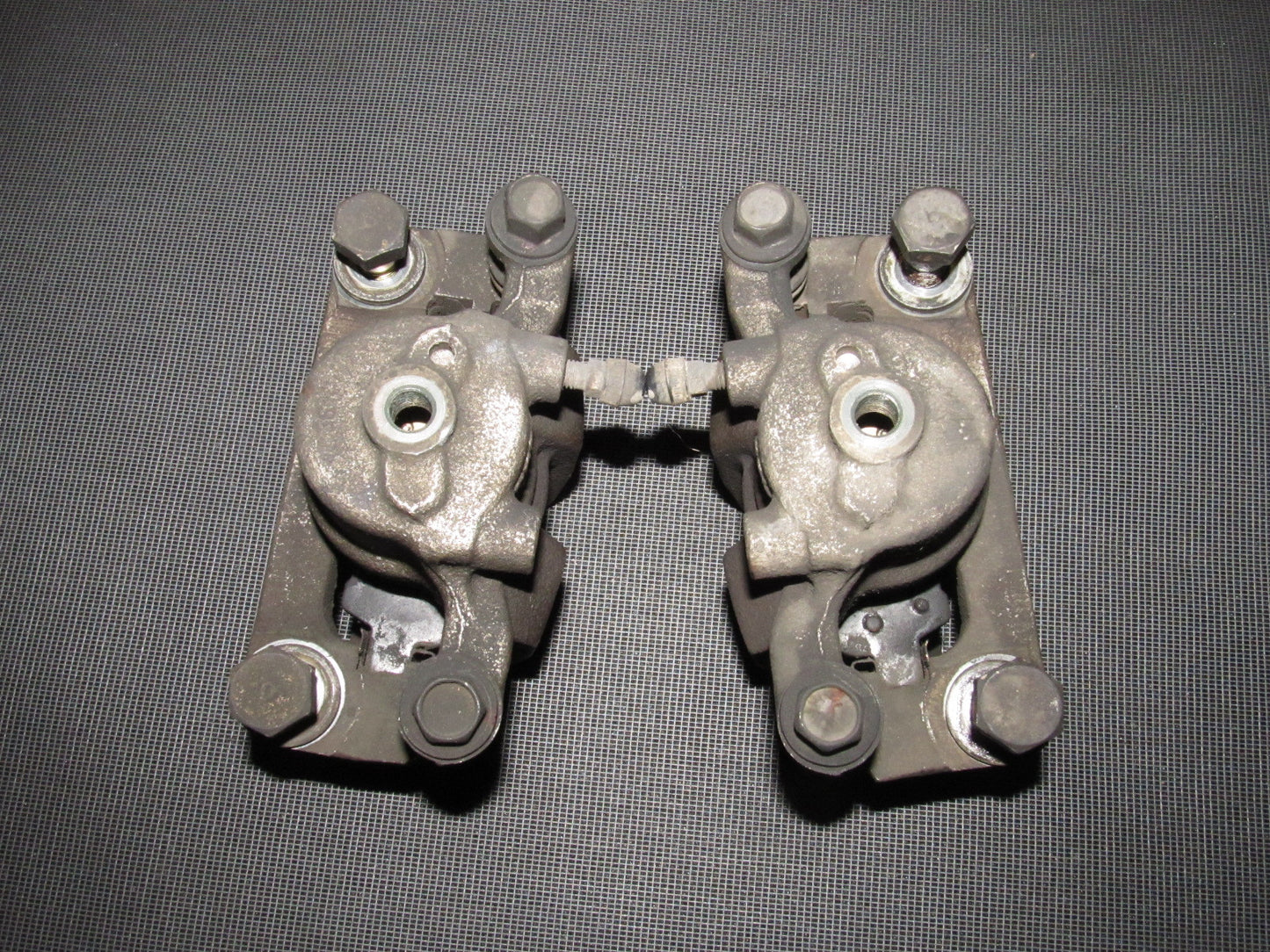 03-04 Infiniti G35 Sedan OEM Rear Brake Caliper Set