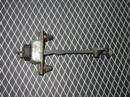 92 93 Lexus ES300 OEM Front Check Stopper - Left