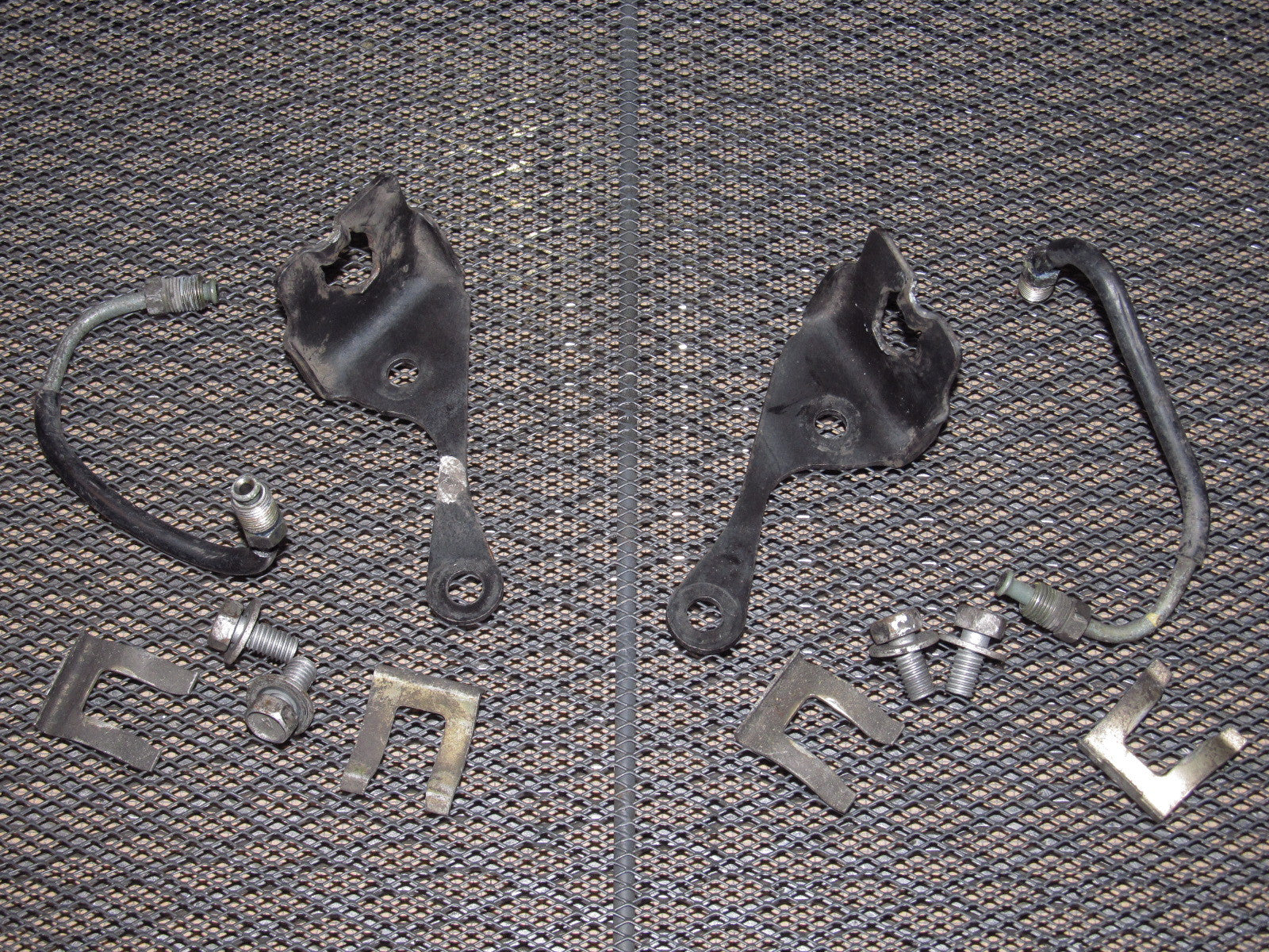 90-96 Nissan 300zx OEM Front Brake Line & Hose Holder Bracket - Set