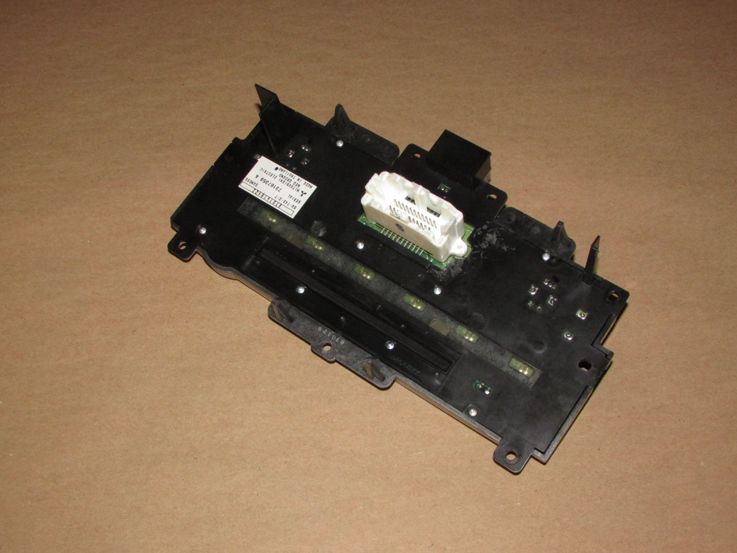 06-11 Mitsubishi Eclipse OEM Stereo Radio 6 Disc Changer Front Control Panel