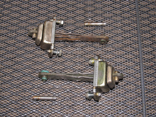 89 90 Nissan 240SX OEM Door Check Stopper - Set
