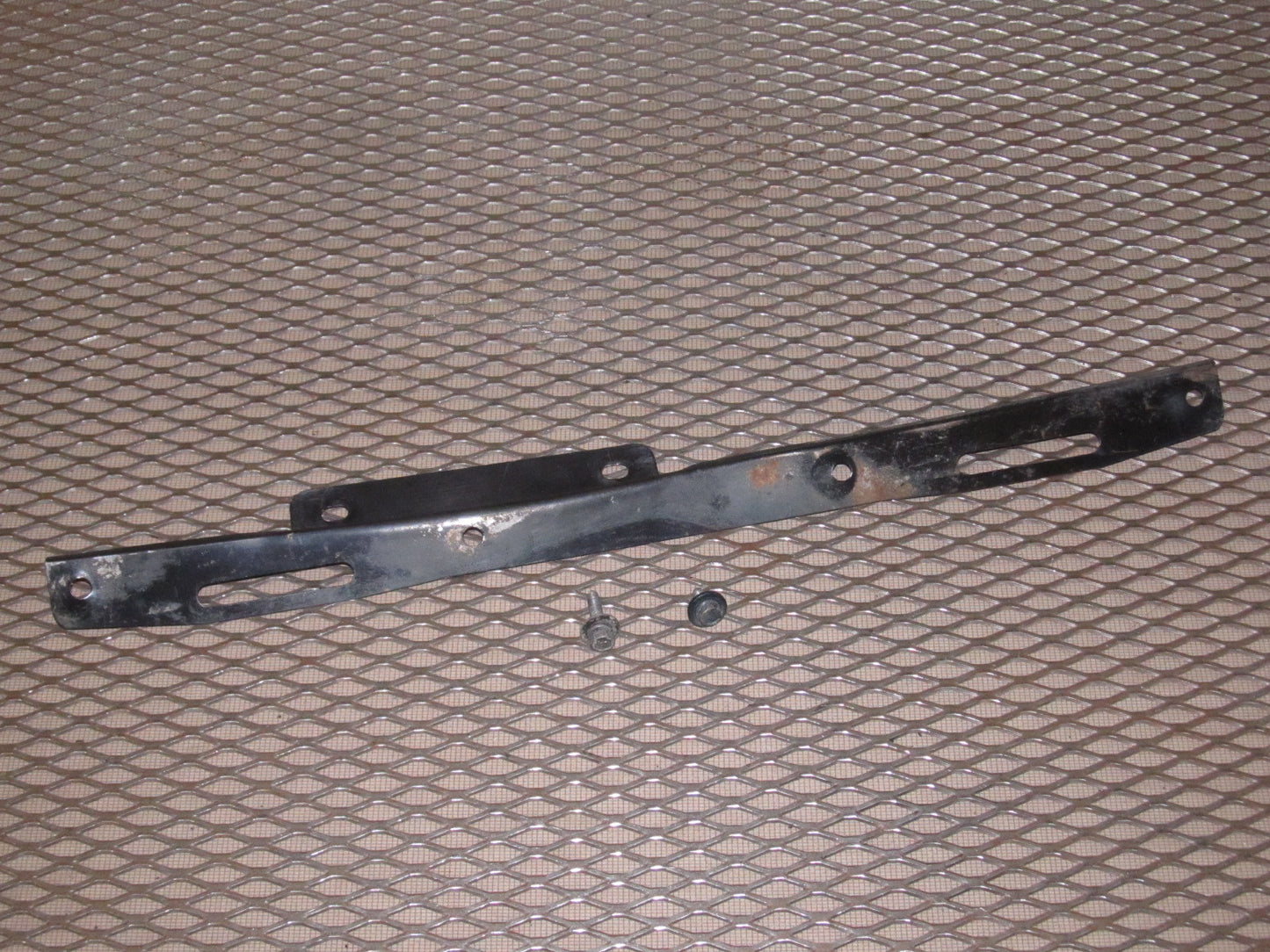 97 98 99 Mitsubishi Eclipse Convertible OEM Rear Bumper Cover Lower Mounting Gasket Plate