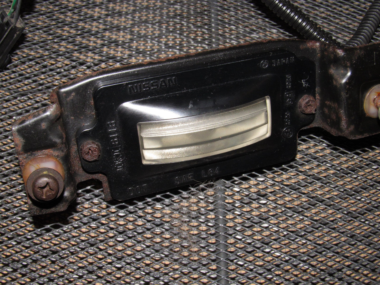 89 90 Nissan 240SX OEM Rear License Plate Light