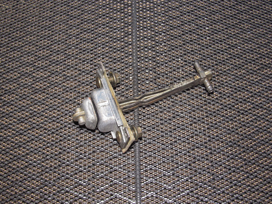 90 91 92 93 Mazda Miata OEM Door Check Stopper - Left