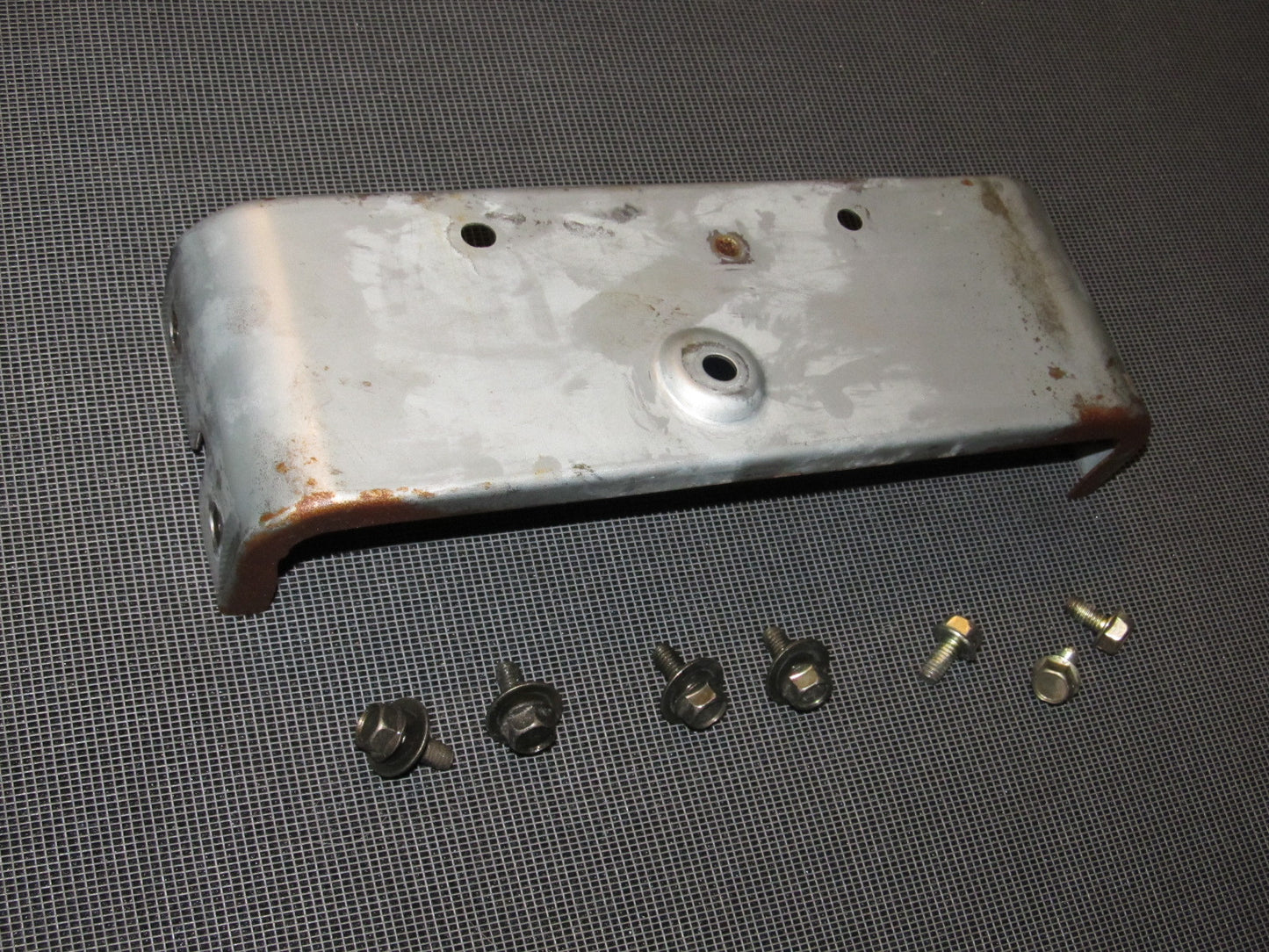 84 85 Mazda RX7 OEM Dash Mounting Bracket - Center