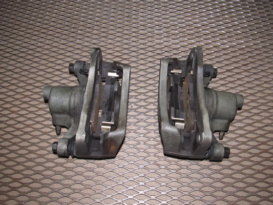 97 98 99 Mitsubishi Eclipse OEM Rear Brake Caliper Set