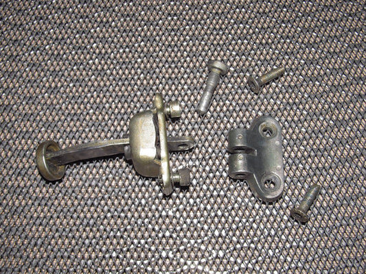 83-85 Porsche 944 OEM Door Check Stopper & Bracket - Left