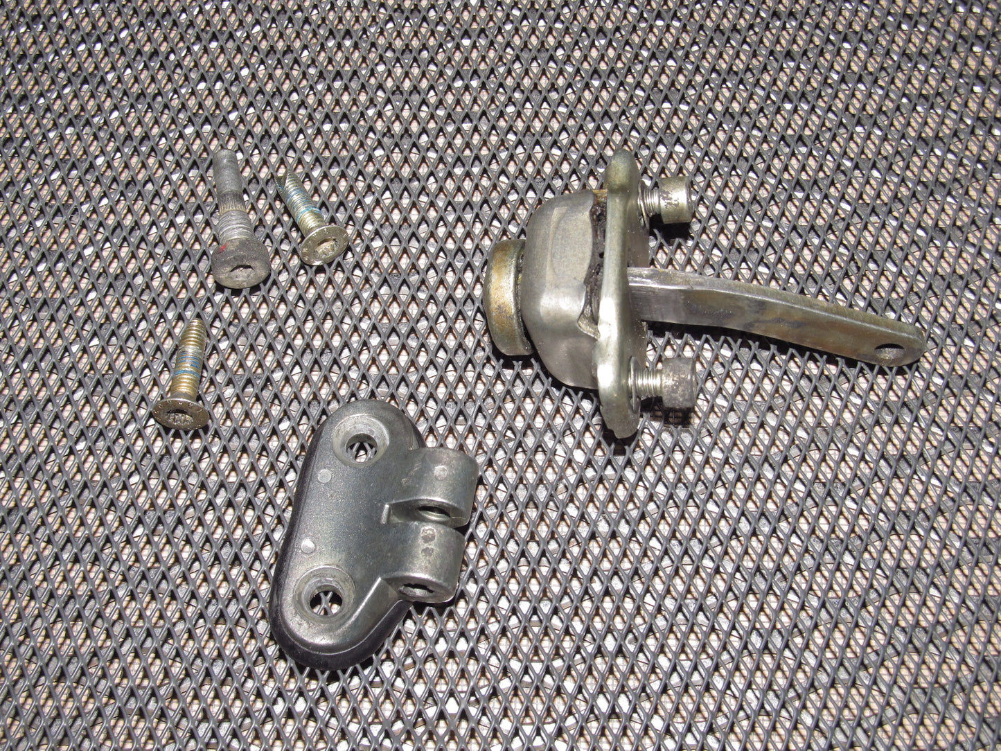 83-85 Porsche 944 OEM Door Check Stopper & Bracket - Right