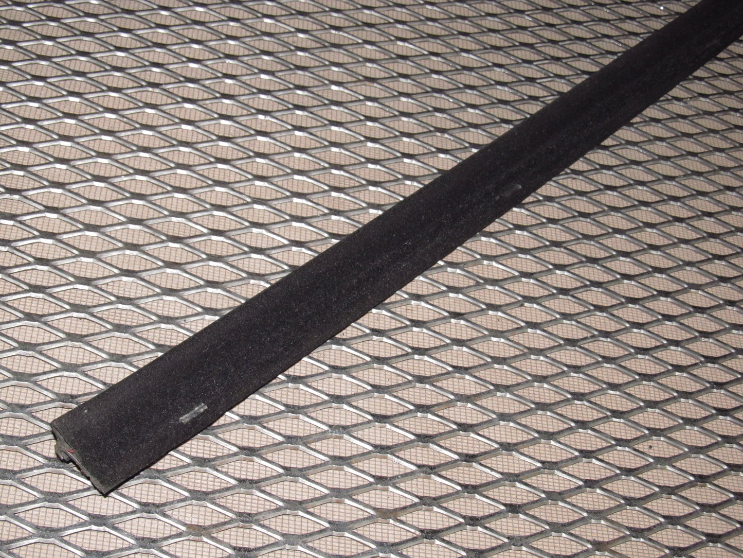 83-85 Porsche 944 OEM Exterior Window Guide Moulding - Left