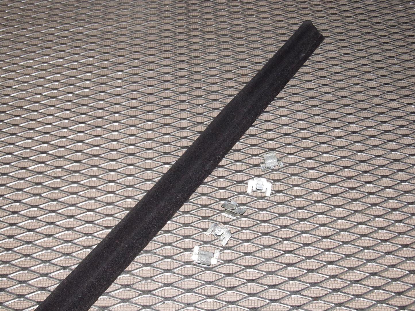 83-85 Porsche 944 OEM Exterior Window Guide Moulding - Left