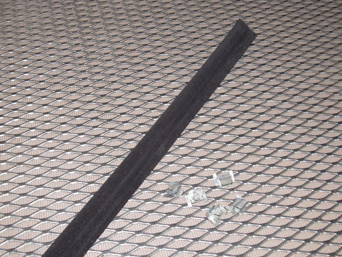 83-85 Porsche 944 OEM Exterior Window Guide Moulding - Right