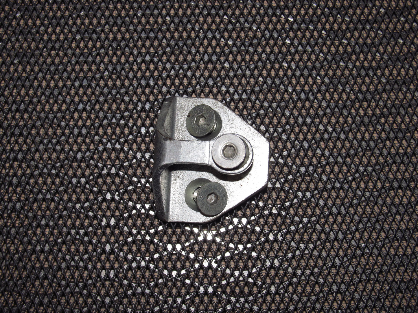 83-85 Porsche 944 OEM Door Latch Striker - Left