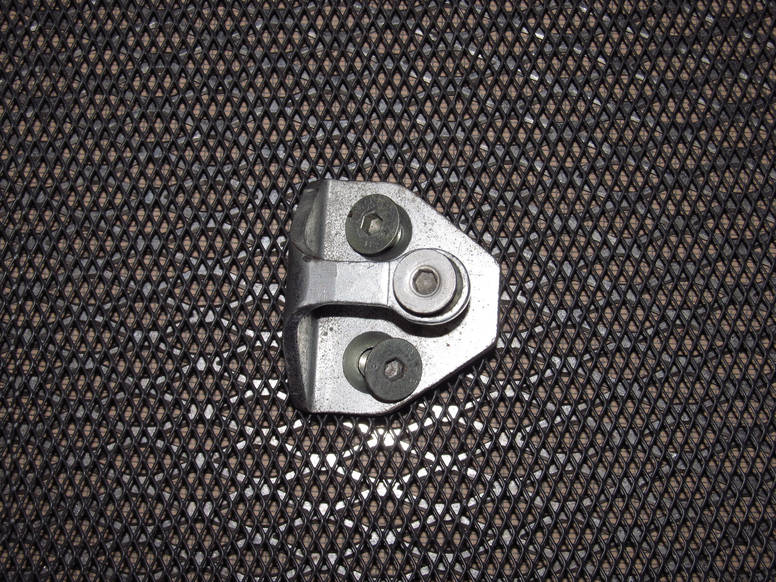 83-85 Porsche 944 OEM Door Latch Striker - Left