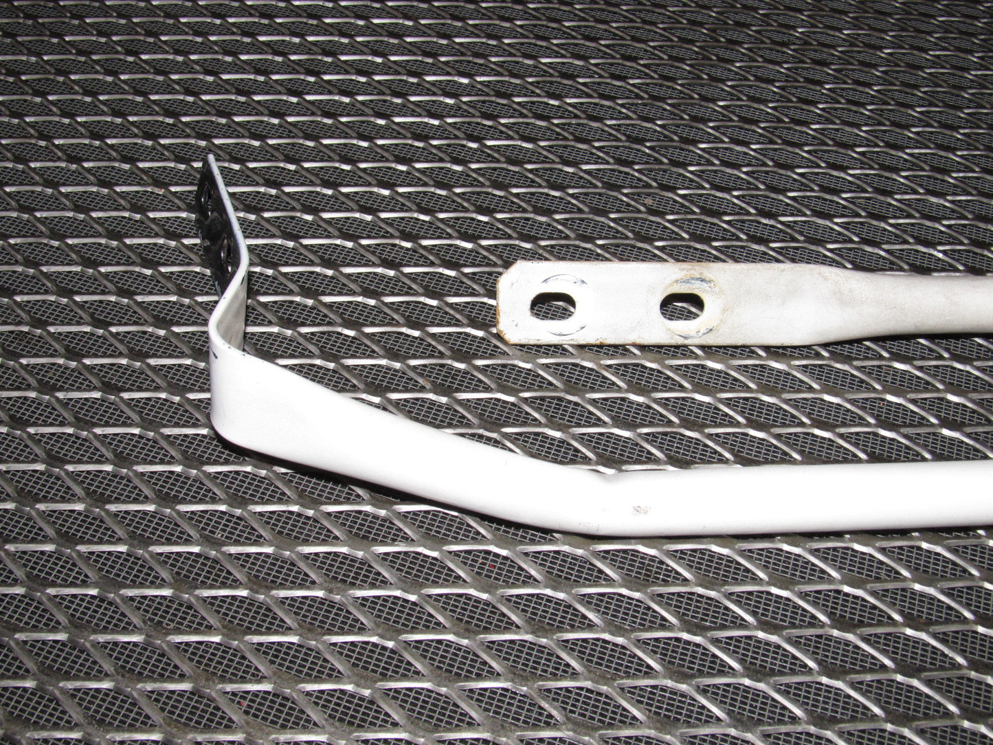 86 87 88 Mazda RX7 OEM Headlight Protector Bar Set