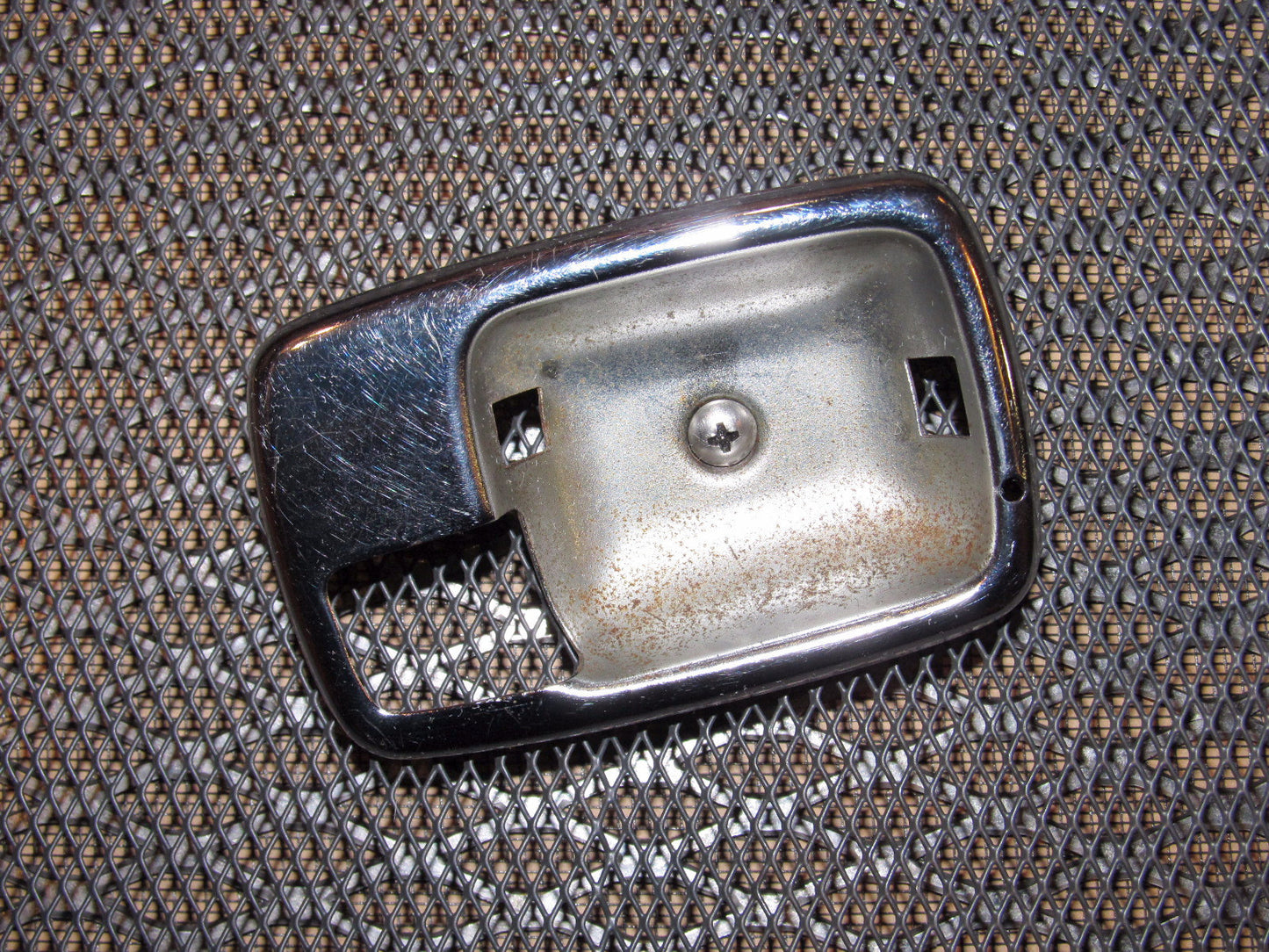 70 71 72 73 Datsun 240z OEM Interior Door Handle Bezel - Left