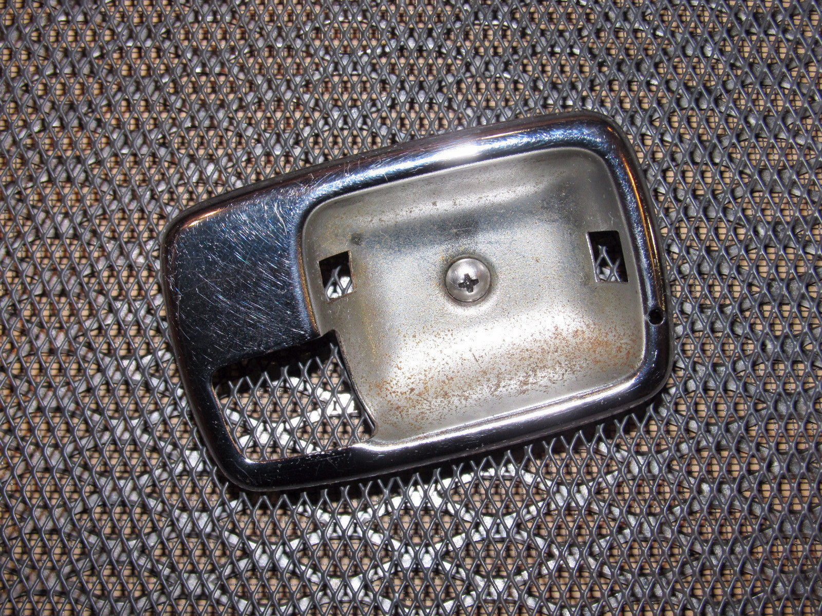 70 71 72 73 Datsun 240z OEM Interior Door Handle Bezel - Left