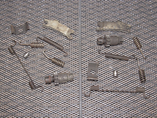 83-85 Porsche 944 OEM Rear Drum Brake Hardware - Set