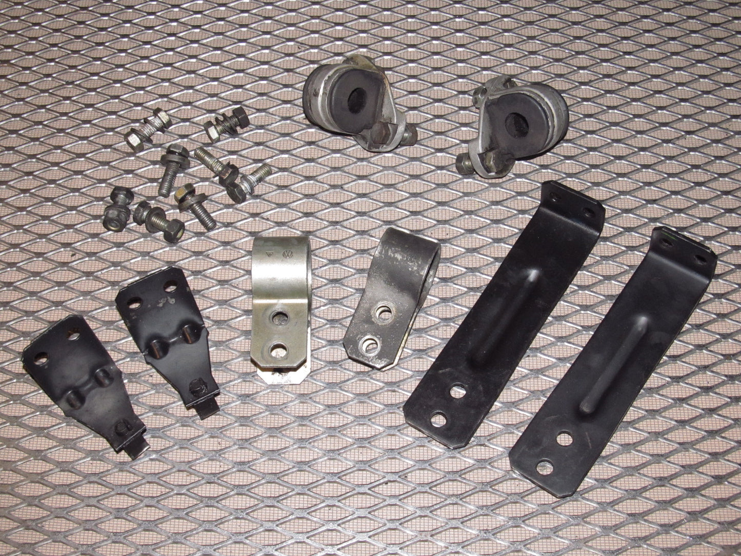 83-85 Porsche 944 OEM Front Stabilizer Bar Mount & Bracket