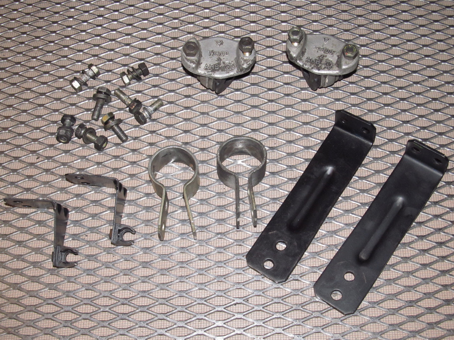 83-85 Porsche 944 OEM Front Stabilizer Bar Mount & Bracket