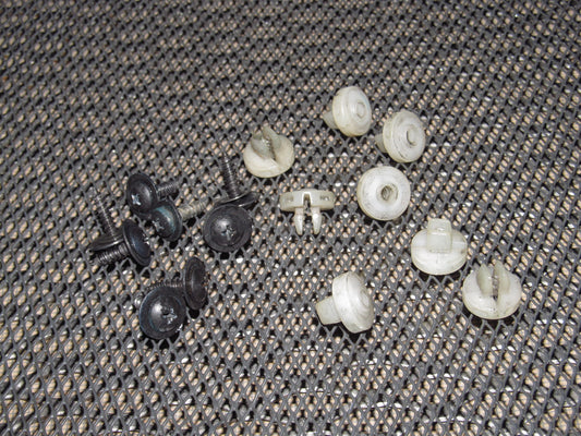 94 95 96 97 Mazda Miata OEM Headlight Retainer & Screws