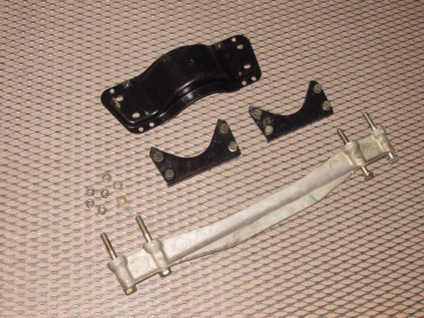 83-85 Porsche 944 OEM Exhaust Pipe Mounting Bracket