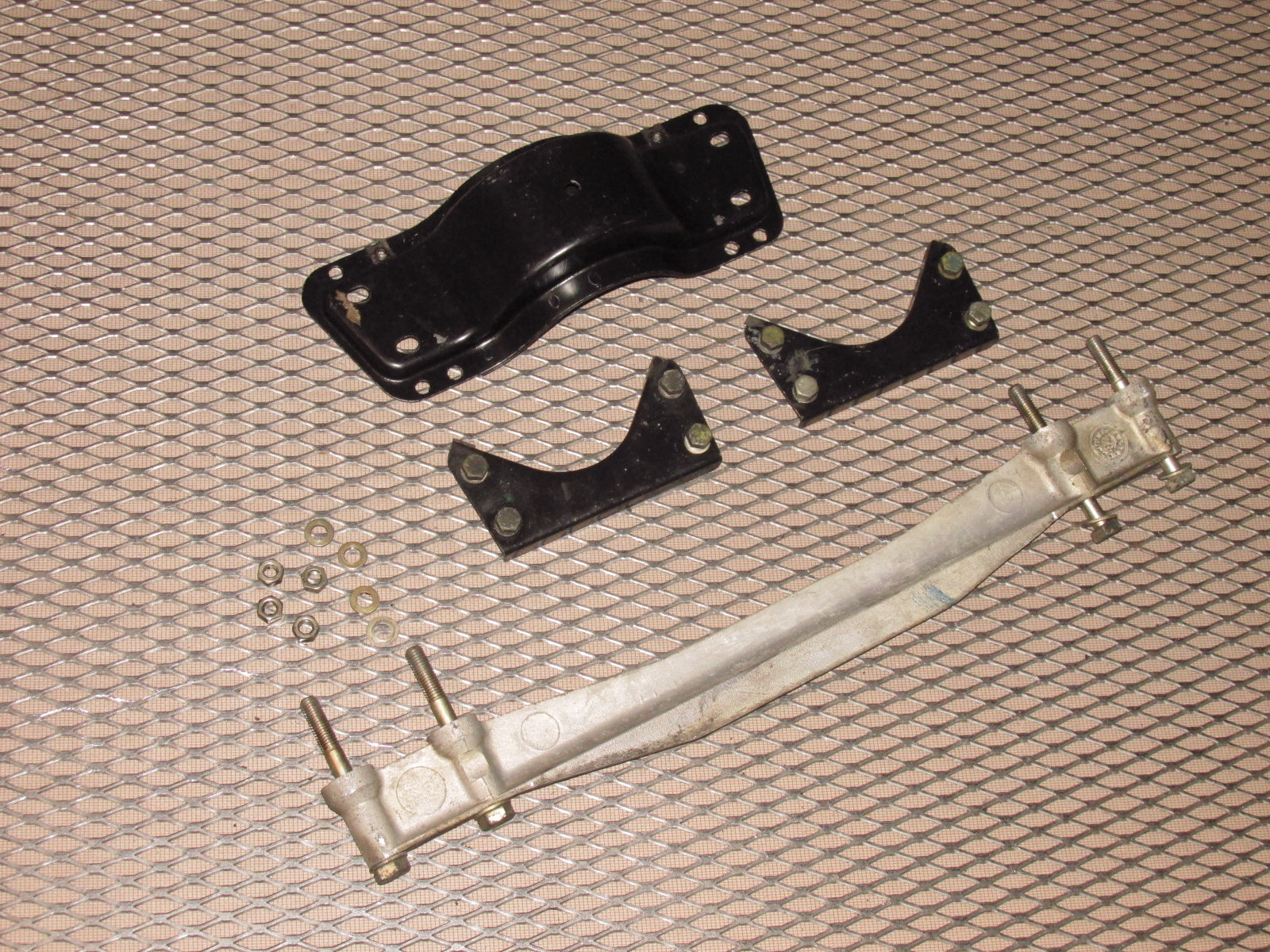 83-85 Porsche 944 OEM Exhaust Pipe Mounting Bracket