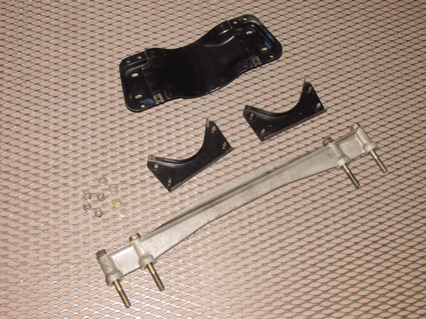 83-85 Porsche 944 OEM Exhaust Pipe Mounting Bracket