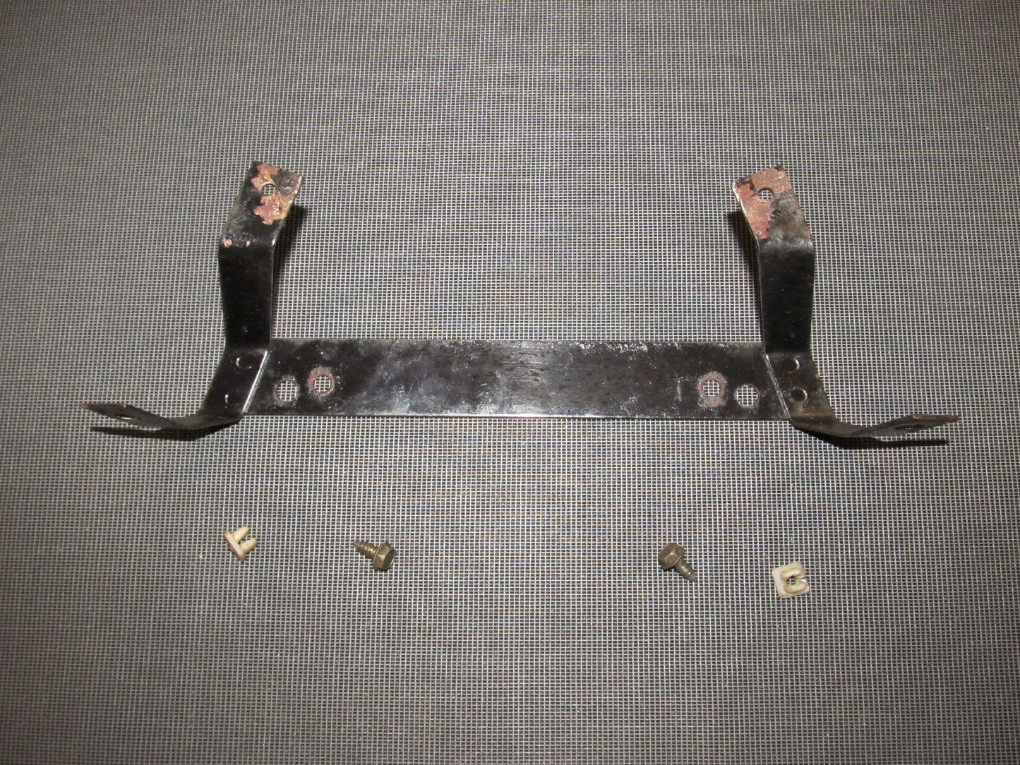 84 85 Mazda RX7 OEM Rear License Plate Holder Bracket