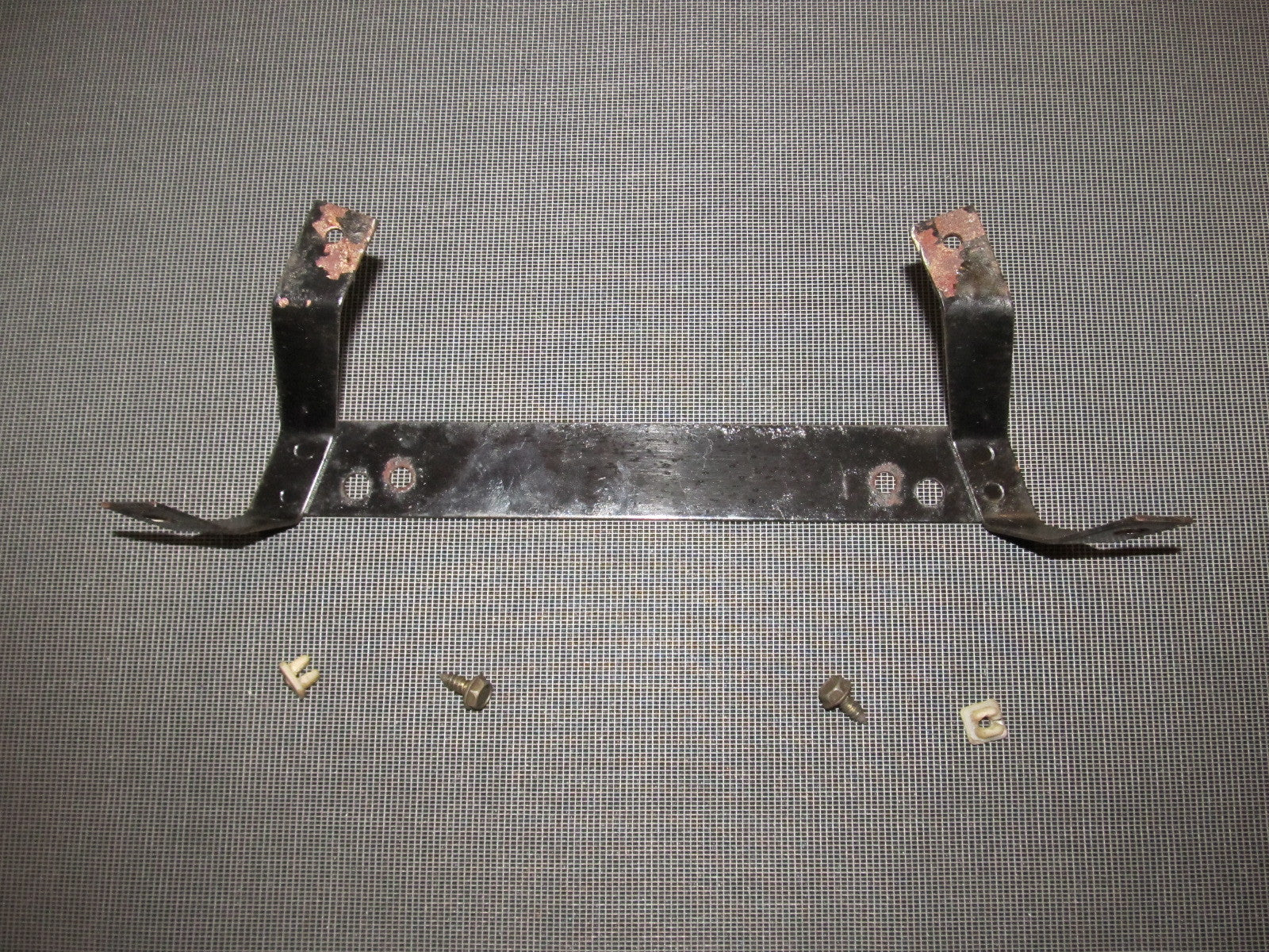 84 85 Mazda RX7 OEM Rear License Plate Holder Bracket