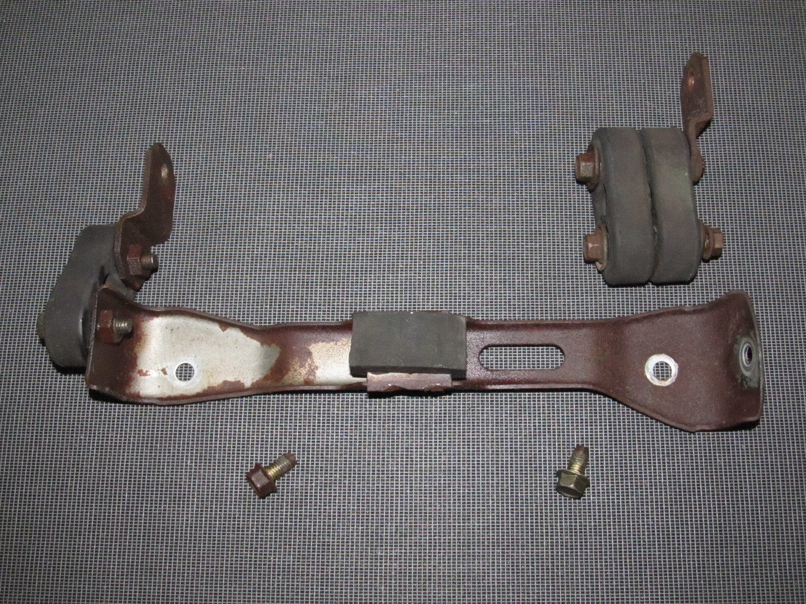 84 85 Mazda RX7 OEM 13B Muffler Hanger Bracket