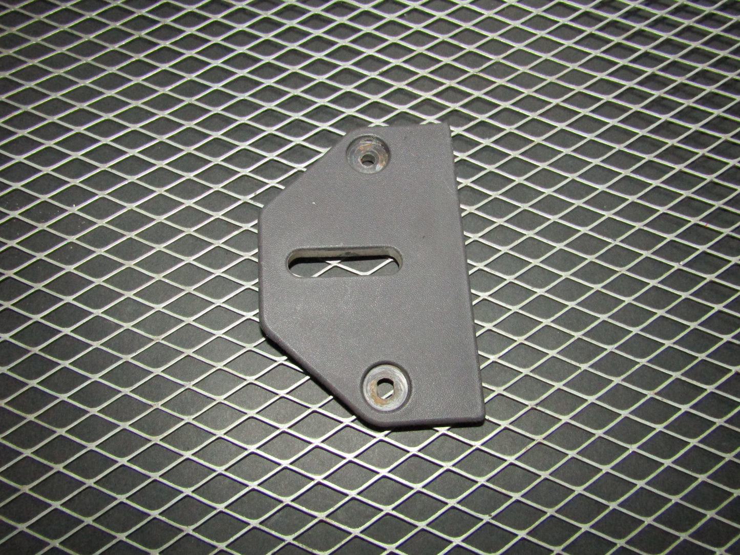 94 95 96 97 Mitsubishi 3000GT OEM Rear Seat Latch Striker Bezel Trim - Left