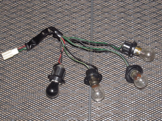 72 73 Datsun 240z OEM Tail Light Bulb Socket - Left