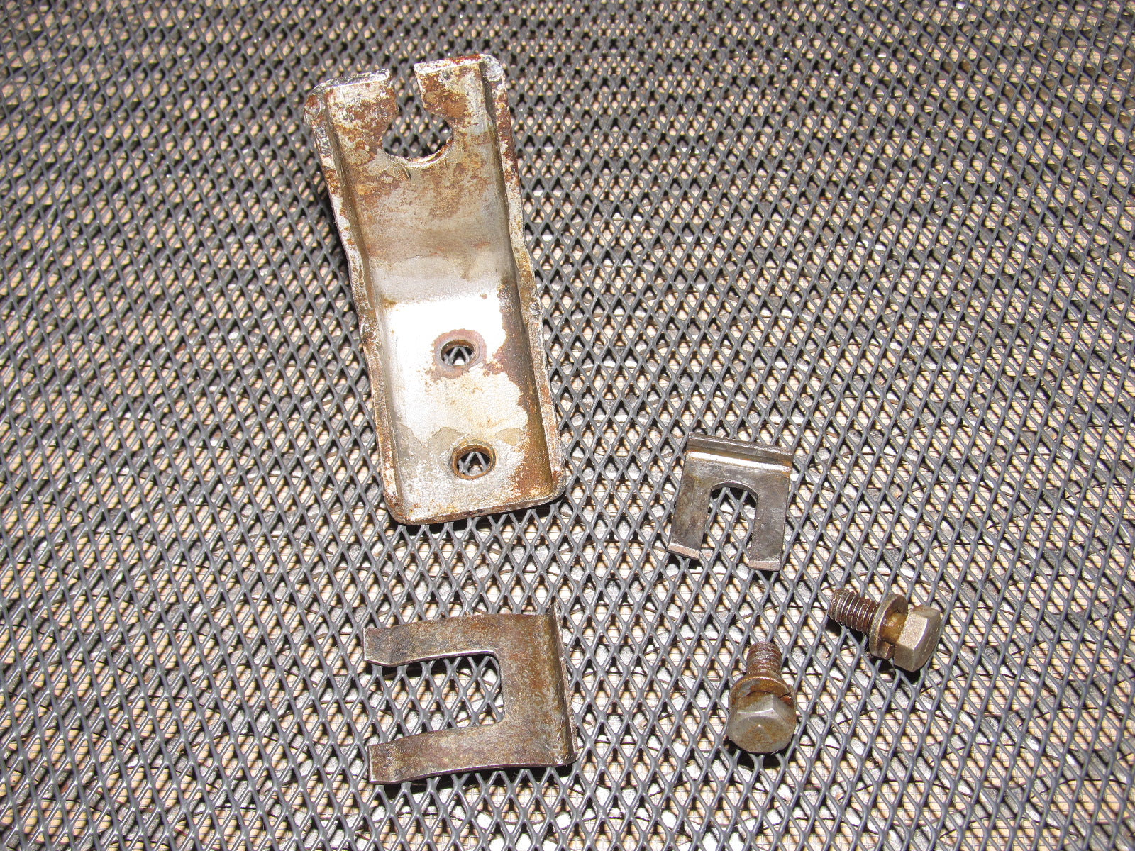 72 73 Datsun 240z OEM Rear Parking Brake Cable Holder Bracket - Left
