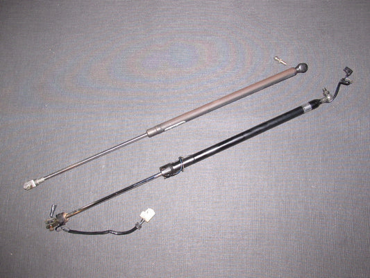 84 85 Mazda RX7 OEM Hatch Door Glass Shock Set