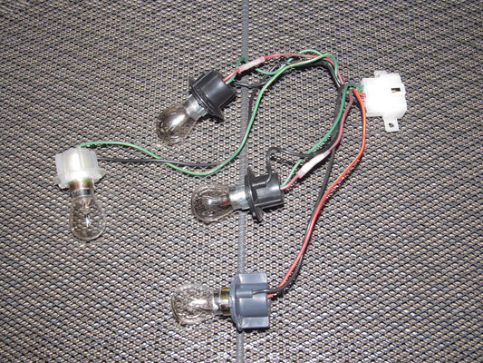 89 90 91 Mazda RX7 OEM Tail Light Bulb Socket - Left