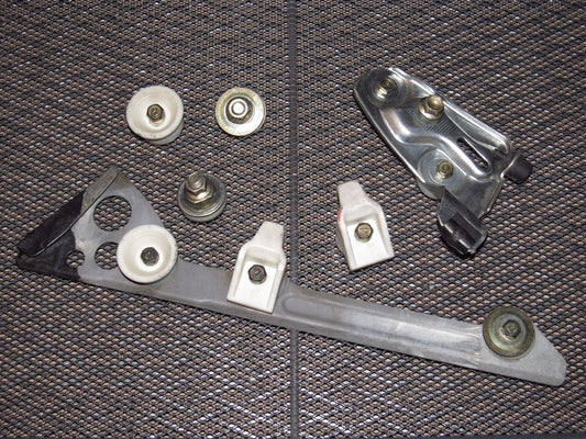 87 88 89 Toyota MR2 OEM Manual Window Bracket & Roller - Right