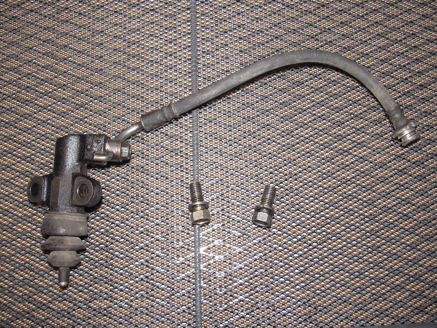 90-96 Nissan 300zx OEM Slave Clutch Cylinder & Hose - NA