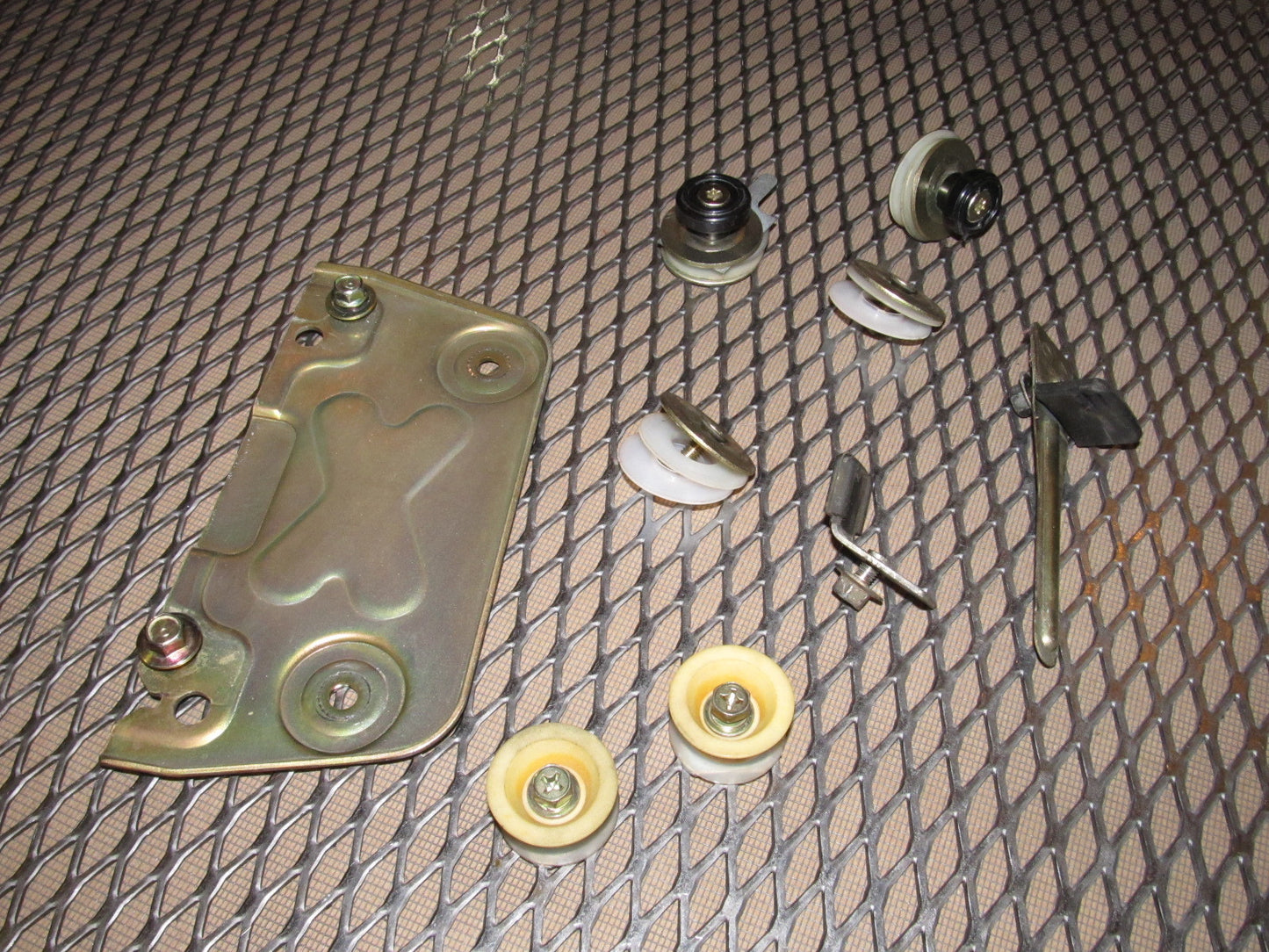 86 87 88 Mazda RX7 OEM Convertible Window Stopper Roller & Bracket - Right