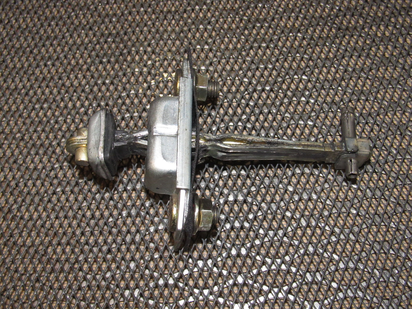 89 90 91 Mazda RX7 OEM Door Check Stopper - Left