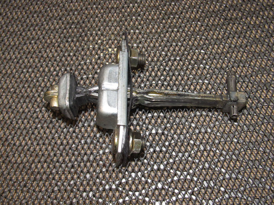 89 90 91 Mazda RX7 OEM Door Check Stopper - Left