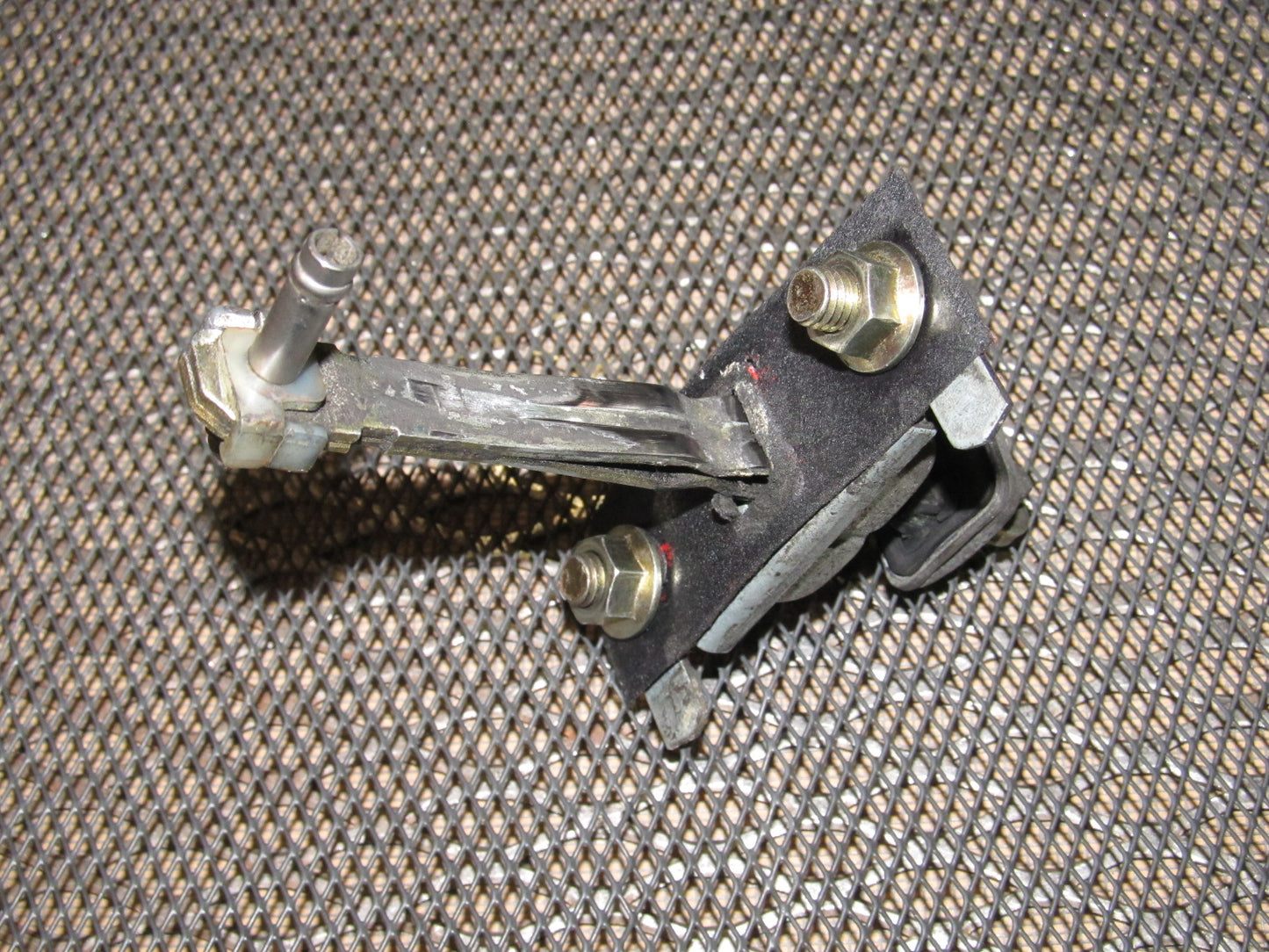 89 90 91 Mazda RX7 OEM Door Check Stopper - Left
