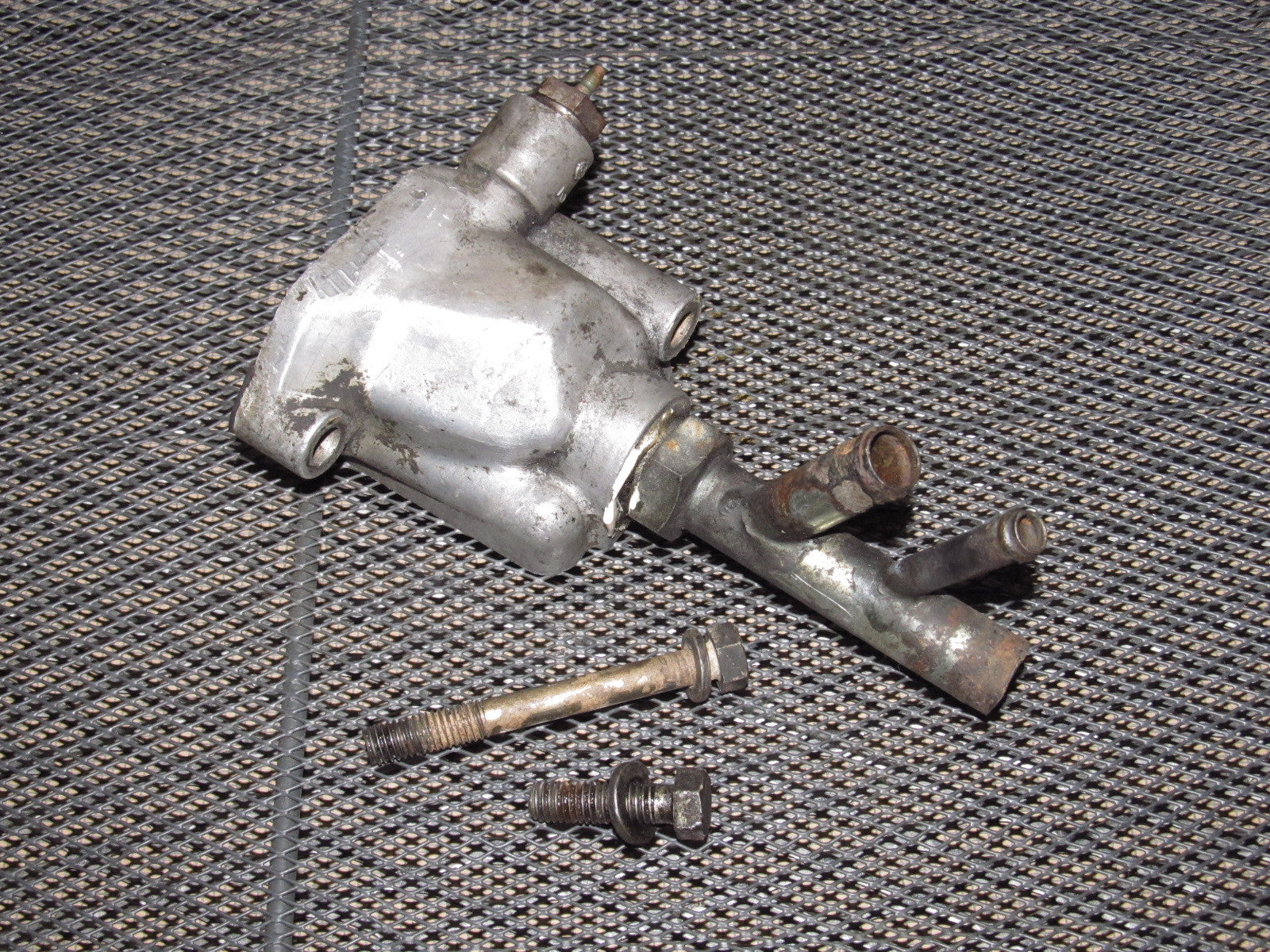 72 73 Datsun 240z OEM Thermostats Housing Water Neck