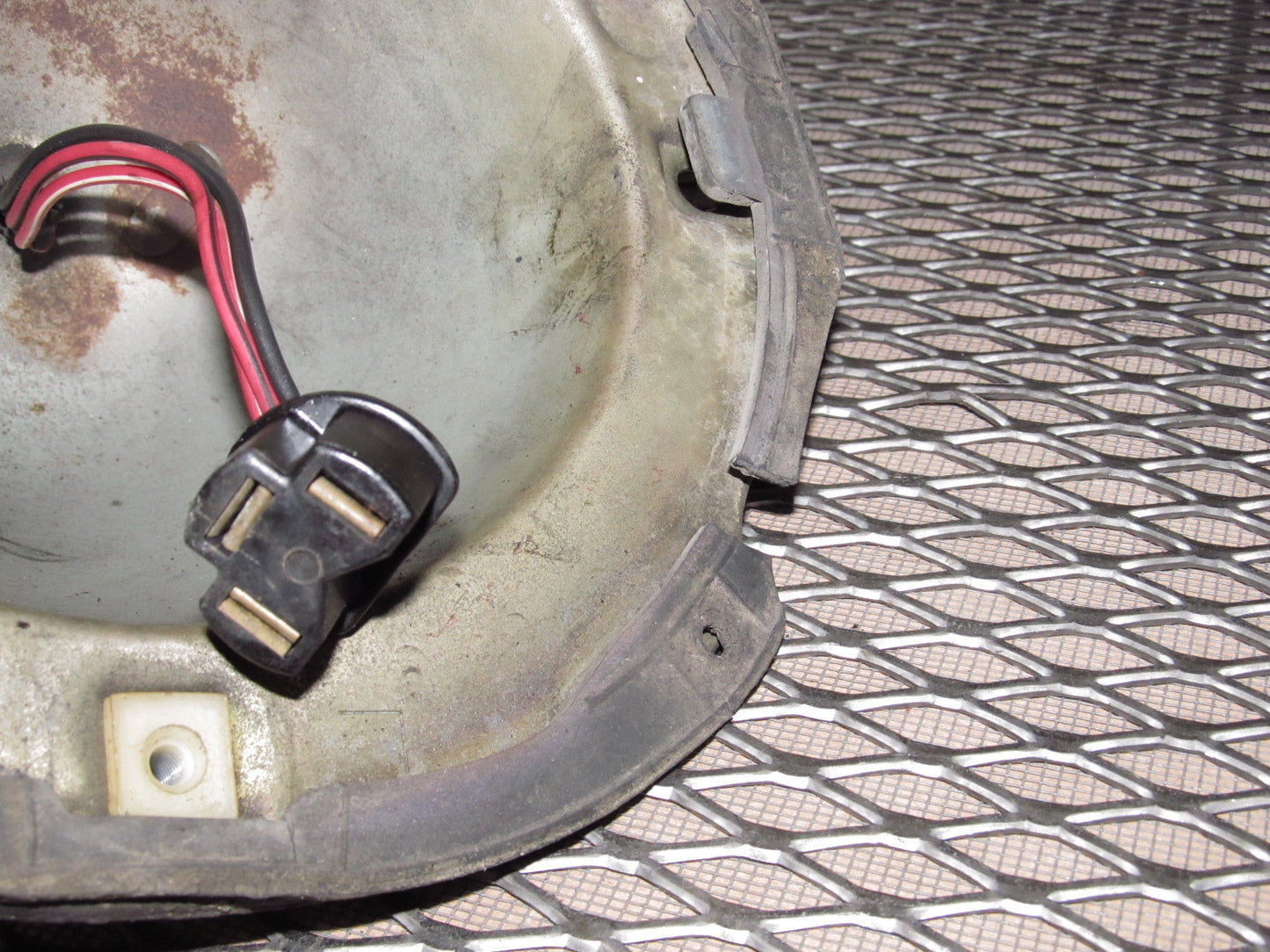 72 73 Datsun 240z OEM Headlight Mounting Housing Bracket