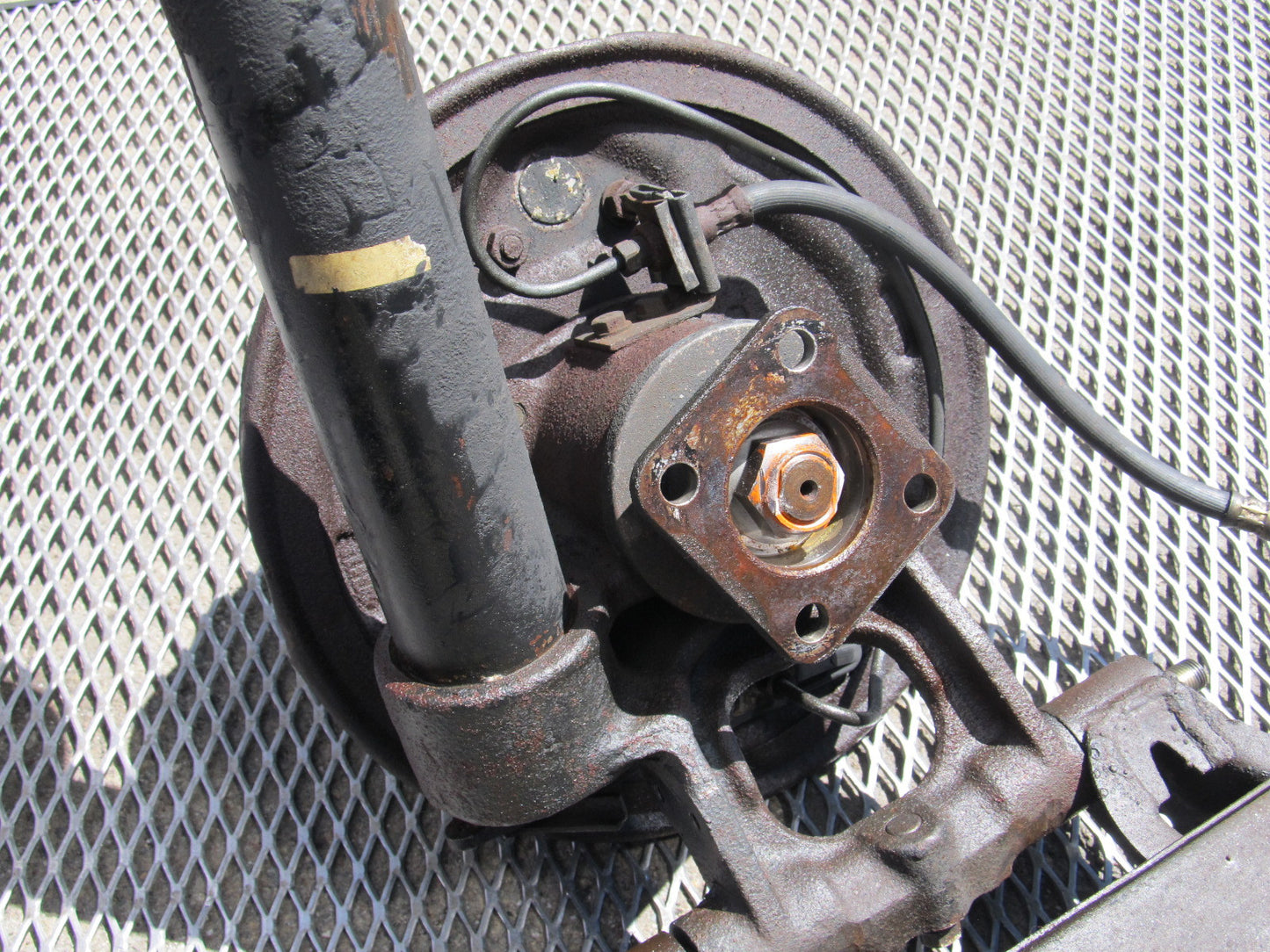 72 73 Datsun 240z OEM Rear Spindle & Control Arm Assembly - Left