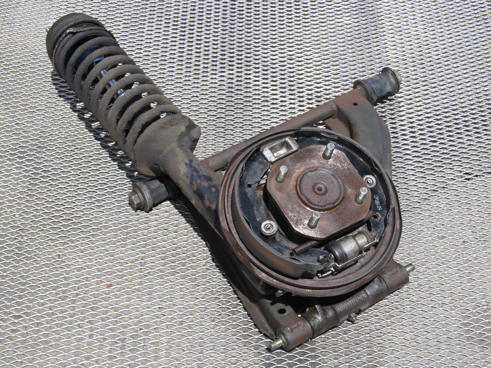 72 73 Datsun 240z OEM Rear Spindle & Control Arm Assembly - Right