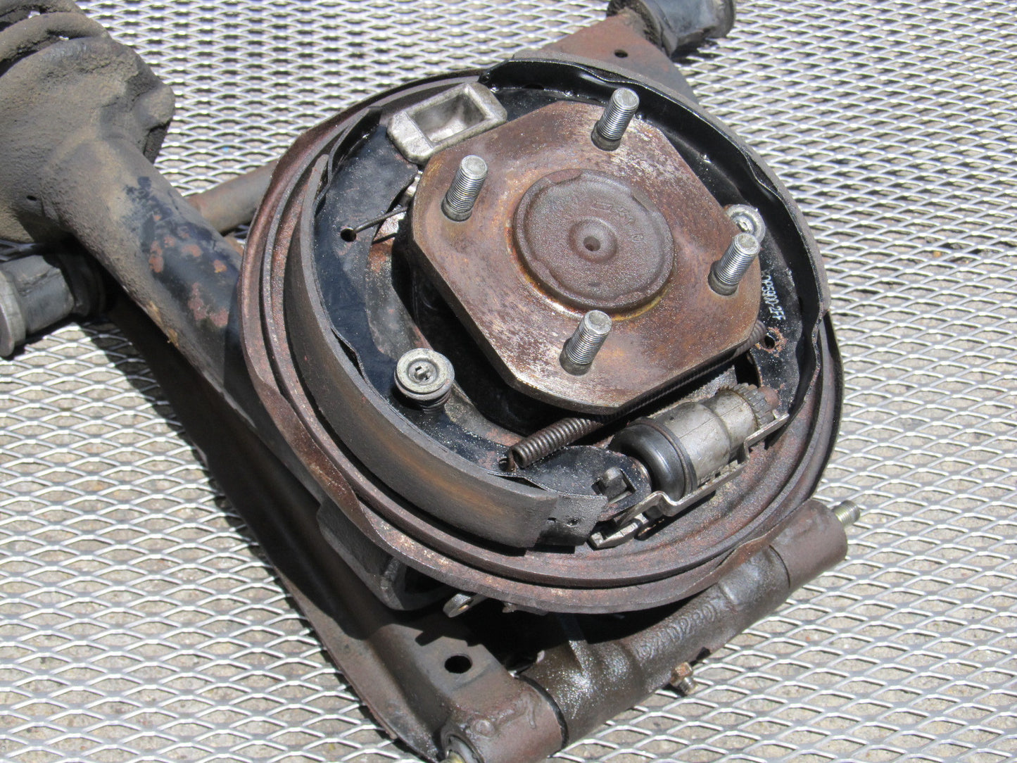 72 73 Datsun 240z OEM Rear Spindle & Control Arm Assembly - Right