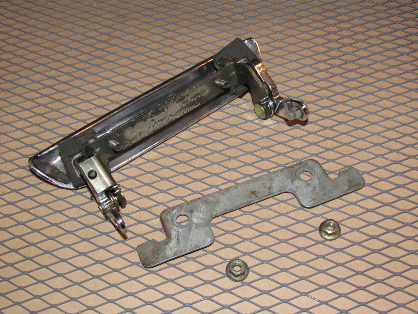 70 71 72 73 Datsun 240z OEM Exterior Door Handle - Left