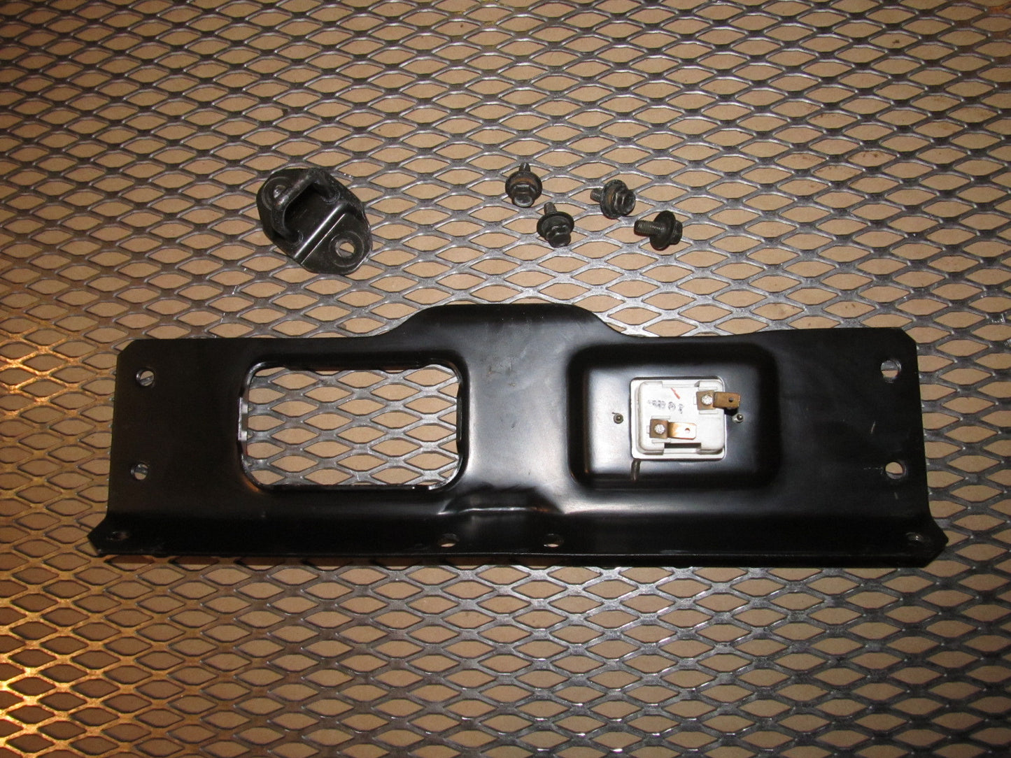 1988 Mazda RX7 OEM Convertible Trunk Light Bracket & Latch Striker
