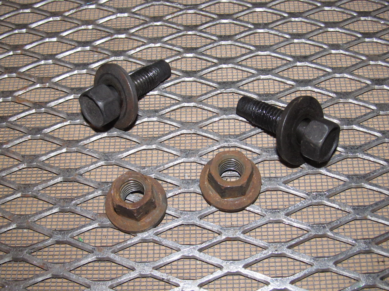 99-04 Ford Mustang OEM Front Seat Track Mounting Bolts & Nuts - Left